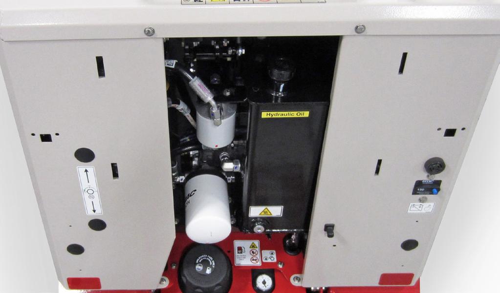 Remove the operator cushion from the rear panels of the power unit. 6. Place a drain pan (minimum 12 quart / 11.5 liter) beneath the operator platform. 7.