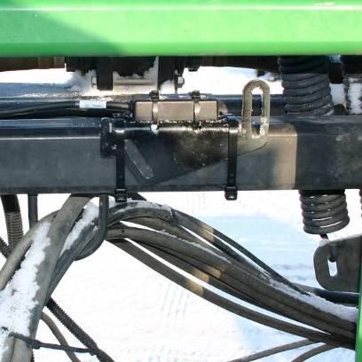 b) The boom roll sensor must be mounted to the rotating part of the boom suspension. c) Use cable-ties to secure the bracket to a square edge feature (square tube).