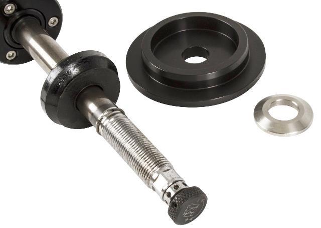 Then, install the Torrington bearing set (Figure 25) by installing one thrust washer, followed by the roller bearing and then another thrust washer.