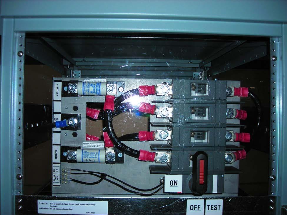 4) Battery Wiring Output connection of Battery Cabinet to UPS Cabinet The output connections from the battery cabinet are the 2 DC fuses that have no cables connected to them and the Neutral terminal