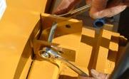 4. Using the 9/16 inch wrenches, temporarily remove the two bolts where the Safety Handle will be secured to the Rapid