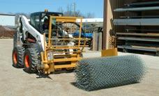 After freeing the right side of the Rapid Roller, the skid-steer