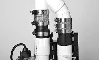 Separate the pump assembly from the no hub coupling and lift it out of the sump pit by the handle on the primary pump.
