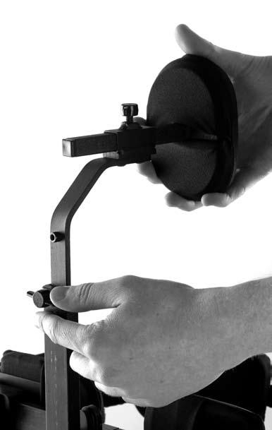 djusting the lateral chest assembly To adjust the height, loosen the adjustment screw (), slide the lateral chest system up or down on the extension tube to desired height and tighten the adjustment