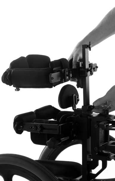 To attach the lateral chest system, slide the extension tube at the back of the lateral chest system