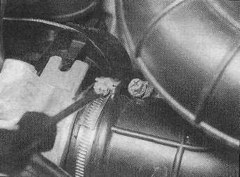 On early models, it will also be necessary to remove the nut and bolt securing the base of the housing to its support bracket (see Remove the O-ring from the manifold, and discard it - a new one