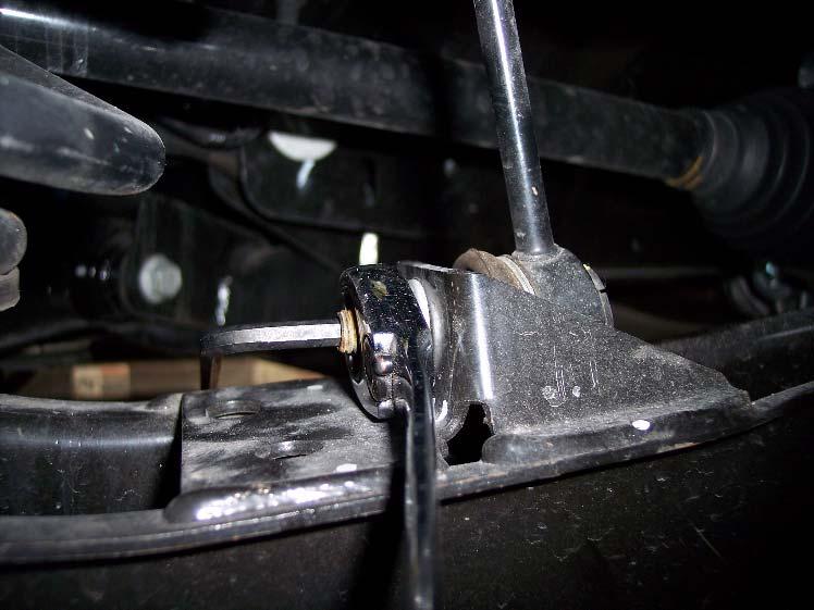 Disconnect the OE end link from the sway bar ends. Retain the nut for reinstallation. 3. Disconnect the OE end link from the front struts.