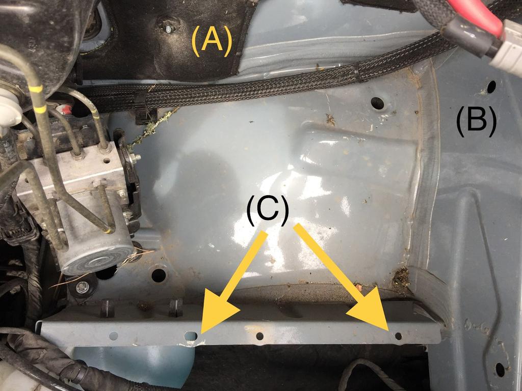 Part 1: Battery Tray Installation 1. Remove the ground connection above the gas pedal in the driver footwell 2.