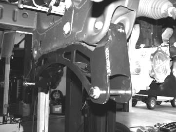 Locate FT20304 Skid Plate and the supplied ½ x 1-1/4 hardware and attach the rear of the skid plate to the bottom of the rear crossmember.