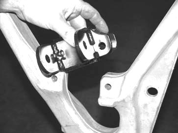 Rotate the lower control arm up and attach the strut to the new mount with the provided ½ x 3 ¾ hardware and torque to 75 ft lbs.