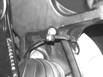 38. Re-route the brake hose and the ABS Line to the steering knuckle using the adel clamp to the back of the steering knuckle and attach with ¼ x 3/4 bolt and washer. Torque to 10 ft LBS.