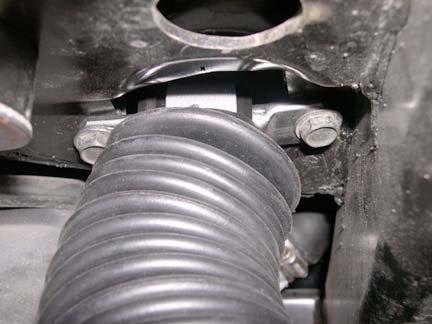 Install two kit absorbers (shock, rear) onto axle with two factory bolts and captive nuts.
