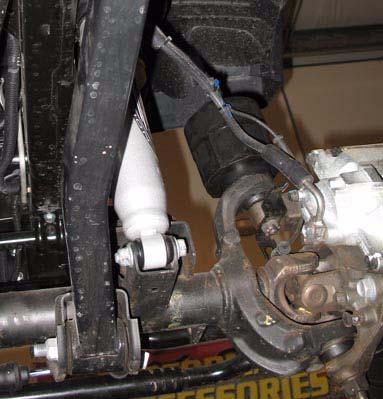 Lower vehicle onto jack stands while maintaining hydraulic jack pressure underneath