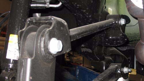 Install kit front upper control arms using O.E. hardware.