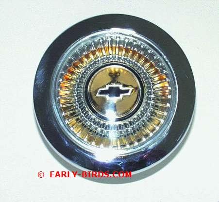 E Style) Picture Product name Description 1964 Standard Wheel Horn Button Assembly. Each This standard Malibu horn button is beautiful.