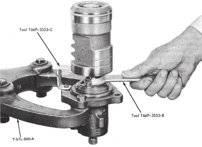 Rockcrawler Steering Shop Manual page3 FIG. 4 Removing Worm Bearing Race Nut the steering shaft assembly. Turn the steering wheel so the spokes are in the horizontal position. 2.