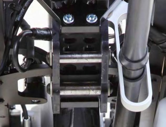 covers are pulled out towards the wheelchair (maximum until the cover is flush with the edge of the clamp for the steering head connection on the product side; refer to following image).