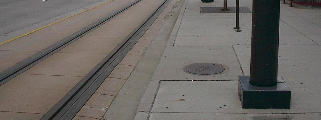 The LRT right of way would also be delineated from the adjacent sidewalk with curb and gutter. The surface colour and texture would further delineate the LRT lane from the roadway and sidewalk areas.