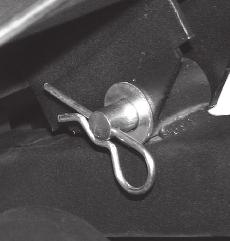 Adjust the Ball Joint up or down on the Latch Rod threads until the Latch Hook closes completely.