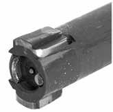 . Repair by stoning burrs and raised surfaces from bottom lug s () forward corner and rear locking surface.