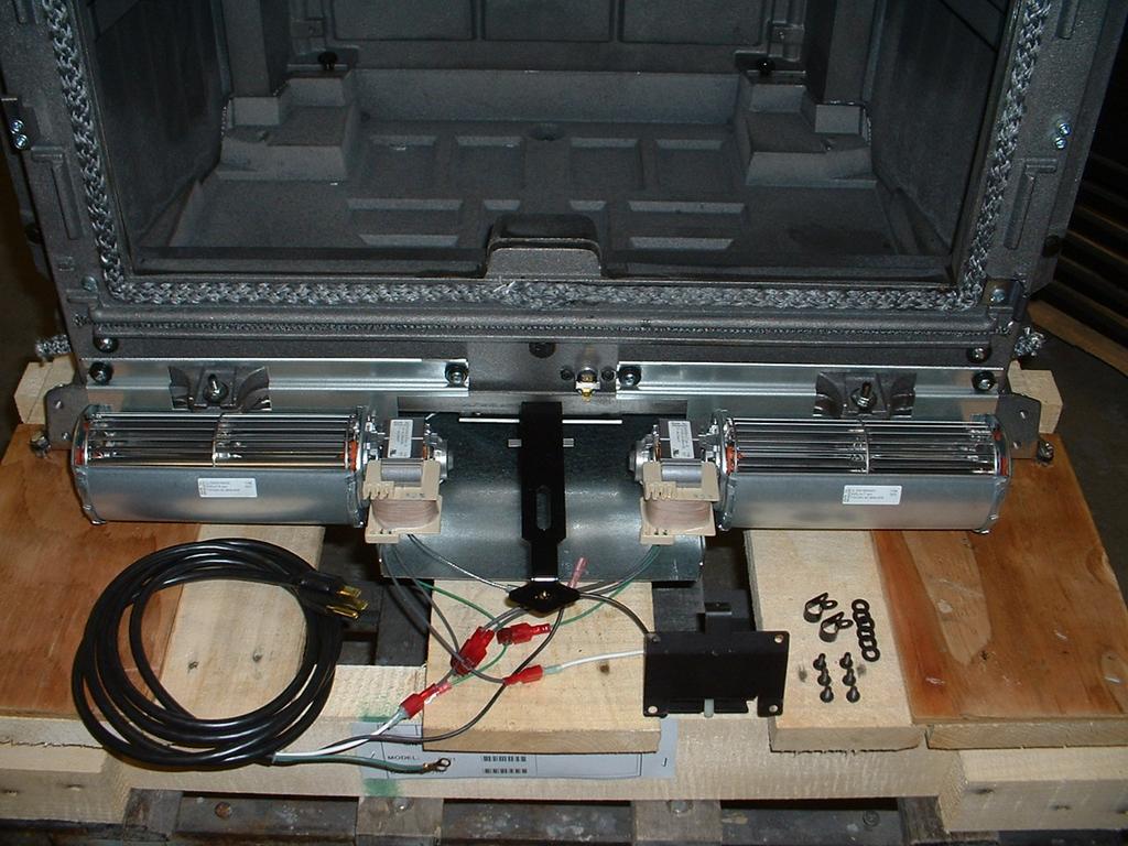 7. Carefully remove the new blower assembly from the packaging. New blowers will come with mounting bushings installed.