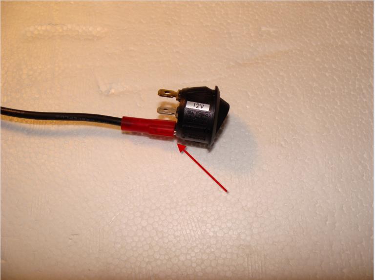 Using the same process previously detailed, attach a flat spade terminal to one end of the extra unused BLACK 20g wire.