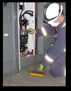 Complete other maintenance/repair duties. Photo is of an Electrician completing a static check of the electrical system in the control room, a programed maintenance task.