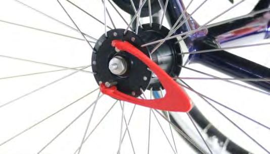 In the closed position, both brake pins are in a lower position and protrude  1 cm beyond the drive wheel hub.