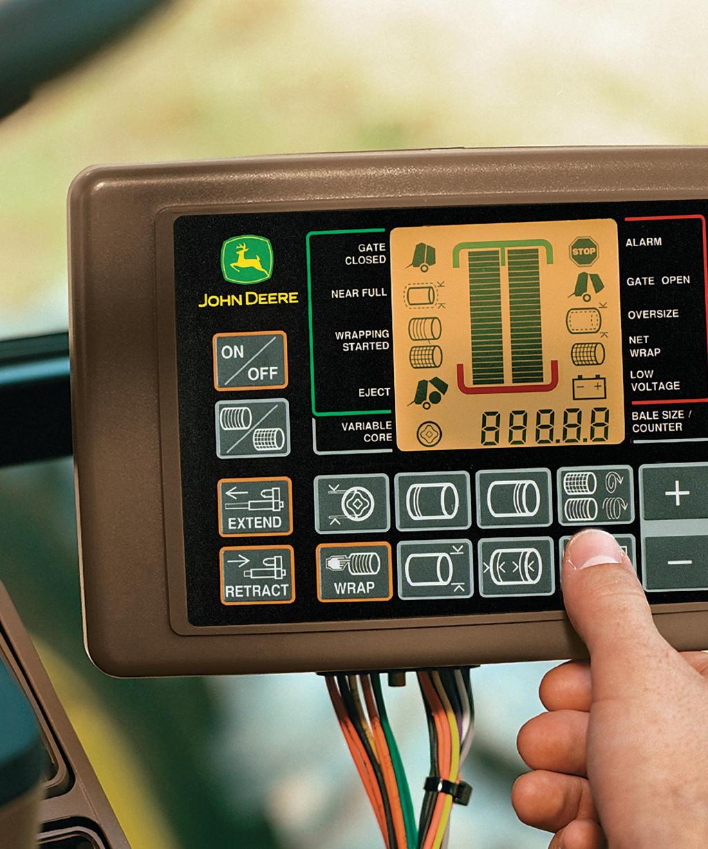 Round Balers 449, 459, 459E, 469, 559, and 569 BaleTrak Pro Monitor-Controller Touch and go There s nothing to using the BaleTrak Pro monitor.