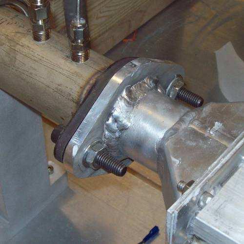 Section 2: Installation of Prototype in Test Stand a) Mate exhaust flanges and bolt into test stand.