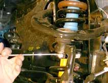 6. Disconnect the OEM outer tie rods from the OEM steering knuckles using a tie rod remover or other suitable tool. (See Photo # 3) 7.