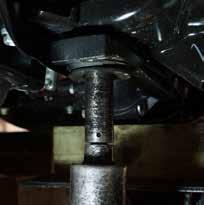 Remove the OEM bolts from the OEM cross member & front differential mounts. (See Photo # 11) Photo # 9 21.
