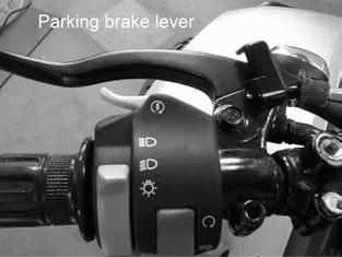 Rear Brake The rear brake is the lever located on the left handlebar. When braking, squeeze this lever. This brake also has a locking feature that allows it to act as a parking brake.