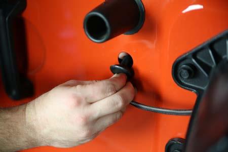 pressing the lock tap down with your thumb and pulling down.
