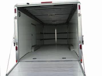Enclosed Car Hauler AER820TA AER824TA AER Inside Trailer shown with optional E-Trac, white lining upgrade on walls, and 48'' escape door Special