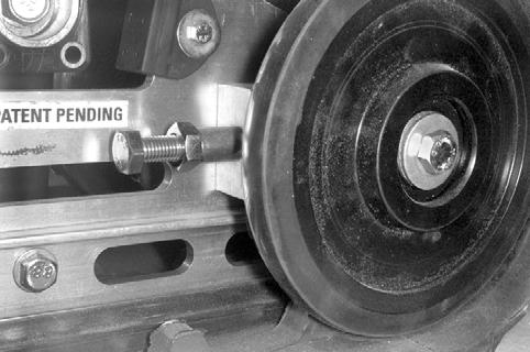 MAINTENANCE Track Tension and Alignment Loosen lock nut on both adjustment screws before adjusting track tension