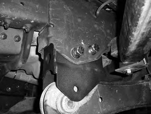 Install the new provided radius arm bracket into the factory frame bracket. Align the hole in the bracket with the factory mount holes and install 3/4" x 5" bolts, nuts and washers in the holes.