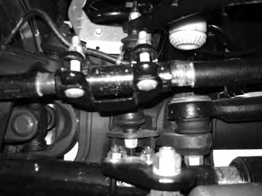 9. Repeat block installation of the driver s side. Take care not to over extend the brake lines. 10.