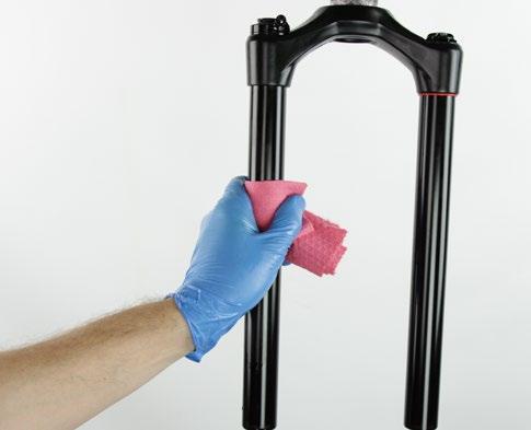 2 Install the lower leg assembly onto the upper tubes and slide it just