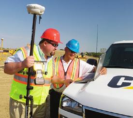 A laser transmitter is set up on the work site and creates a constant grade reference over the work area.