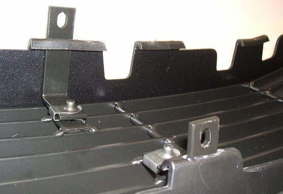 Install the two (2) Long L Brackets to the lower mounting holes as shown in Figure 14.