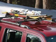 CARRIERS & CARGO HAULING Racks & Carriers - Ski & Snowboard Carrier, Roof-Mount Commander 2010 2006 A 10900 Aluminum bars hold six pairs of skis or four snowboards and mounts to T-slot roof rack