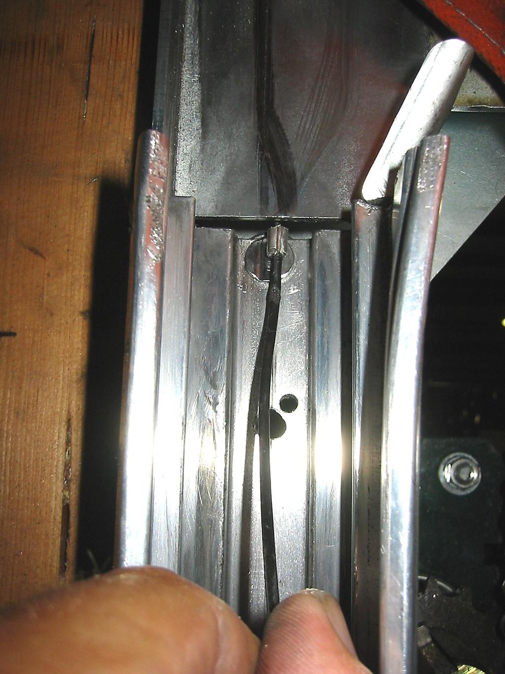 Extrusion and the bottom of the funnel section of the Upper Bracketry as shown in the following