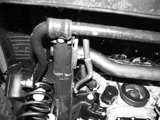 Figure 20 38. Install the air box in its original location. Reattach the engine breather hose and intake hose to the air box. Tighten the intake hose clamp securely. 39.