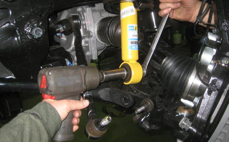 Re-attach the upper ball joint to the steering knuckle using the OE nut and