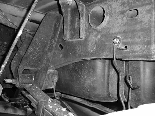 Figure 44 4. Disconnect the factory brake line bracket attached driver's side frame rail. The nut is accessed on the outside of the frame (Fig 45). Figure 45 5.