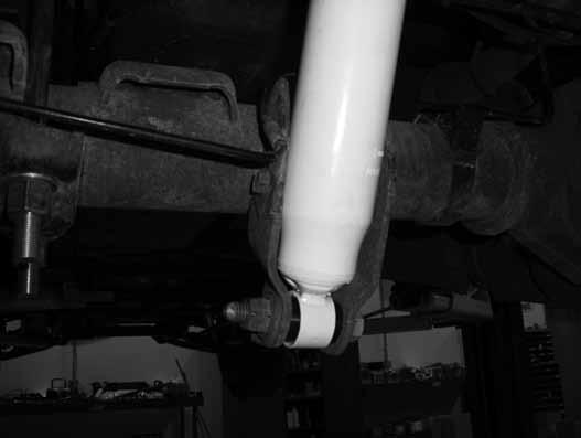 Lightly grease and install the provided bushings and sleeves in the new BDS leaf springs. 12.