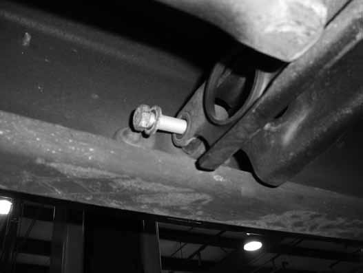 On most vehicles this will require a using a hammer/punch or air hammer. Access the end of the torsion bar through the hole in the back of the torsion bar crossmember and drive forward.