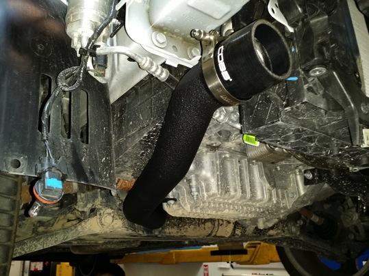 3. Now, install the larger charge pipe into the turbo silicone and onto the threaded post coming off the motor where the factory charge pipe was connected. Install a 2.