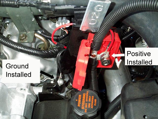 18-Nov-09 GMC/Chevy Duramax LLY Engine #1024318 319 & DA 16 Power Hook-up Open the red protective cover of the remote battery connection and you will see a nut and stud attached to the positive